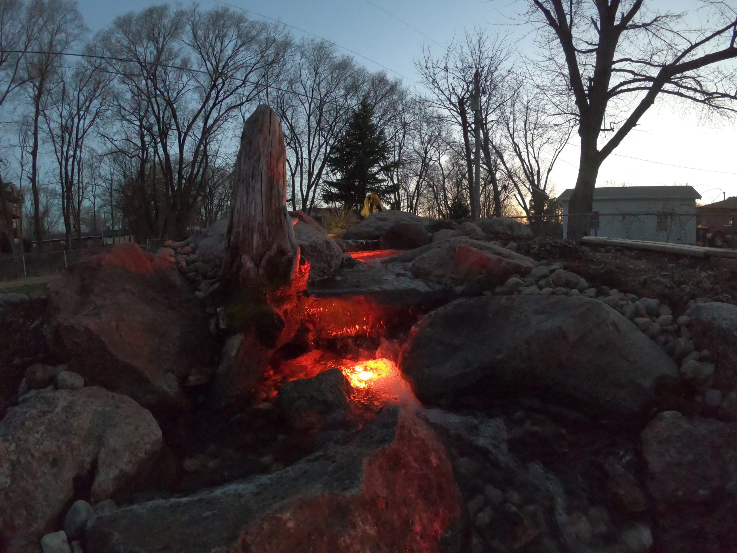 Nighttime pond scene with custom lighting