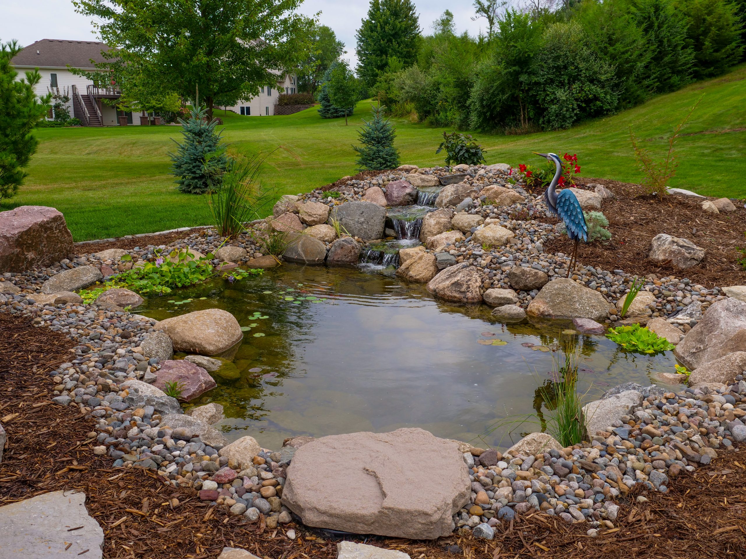 Finished water feature from the Tranquil Backyard Escape, Polk City project by Just Add Water
