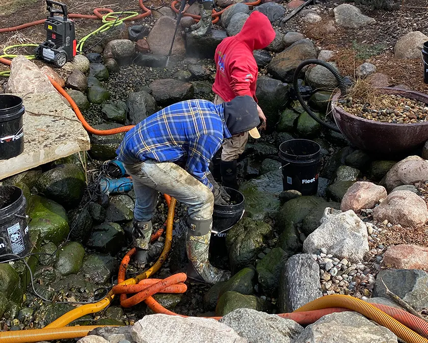Pond being cleaned and inspected