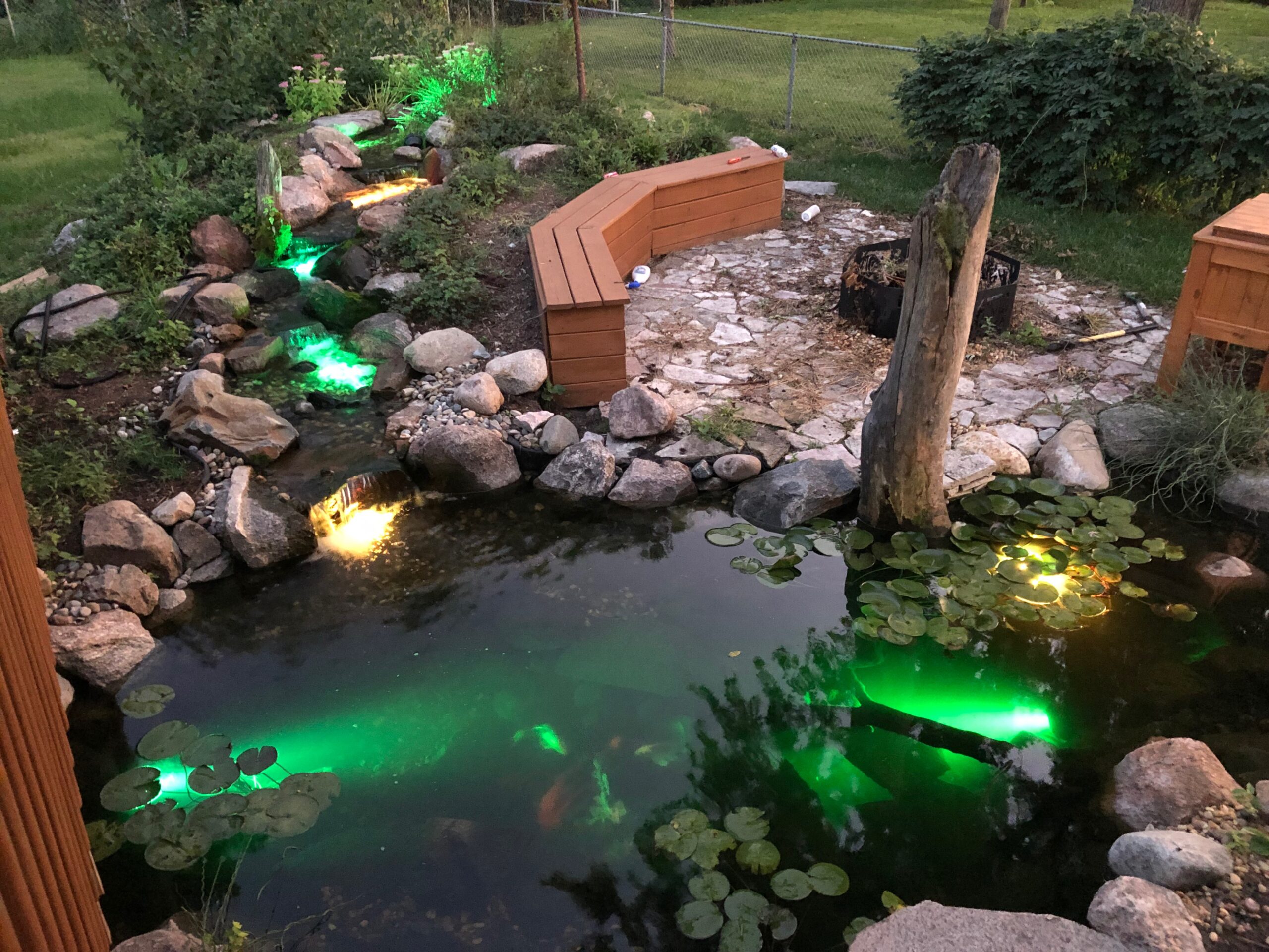 Waterfall lighting in a Central Iowa backyard