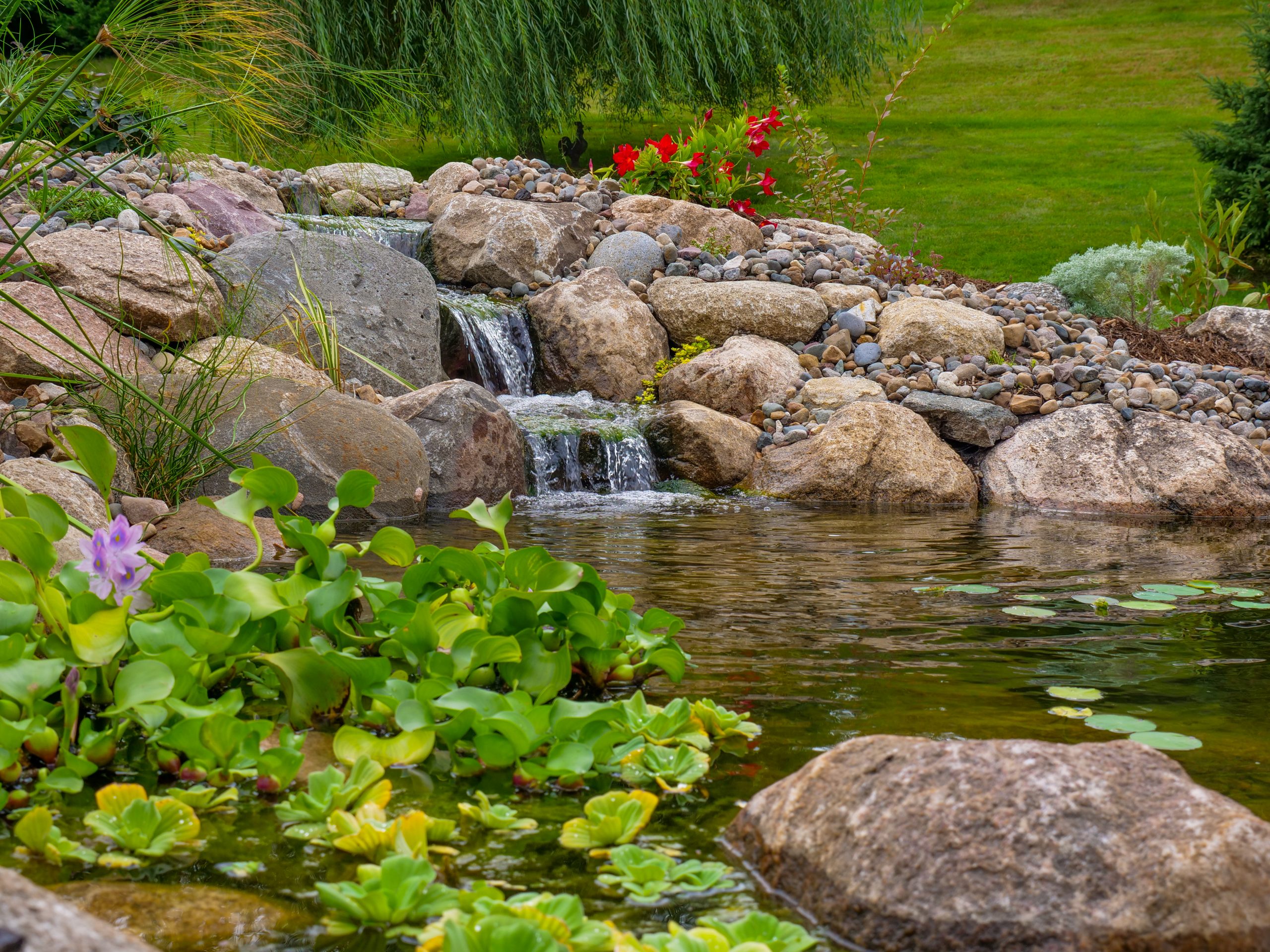 Waterfall detail with surrounding landscape