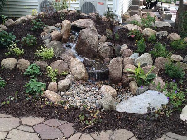 Costs To Install A Pondless Waterfall, How Much Does It Cost To Install Landscape Rock